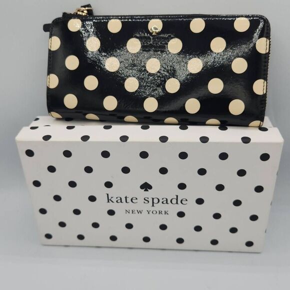 kate spade Handbags - Kate Spade charming dot black and cream zip around wallet with gift box